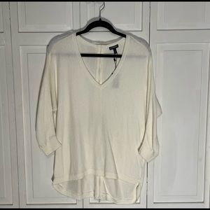 Cream colored sweater, zipper back to be worn open!